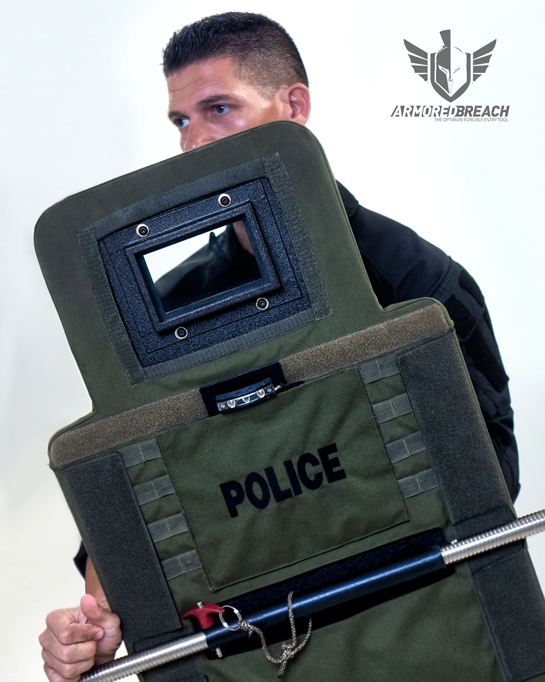 Operator demonstrating the Guardian Breaching Shield