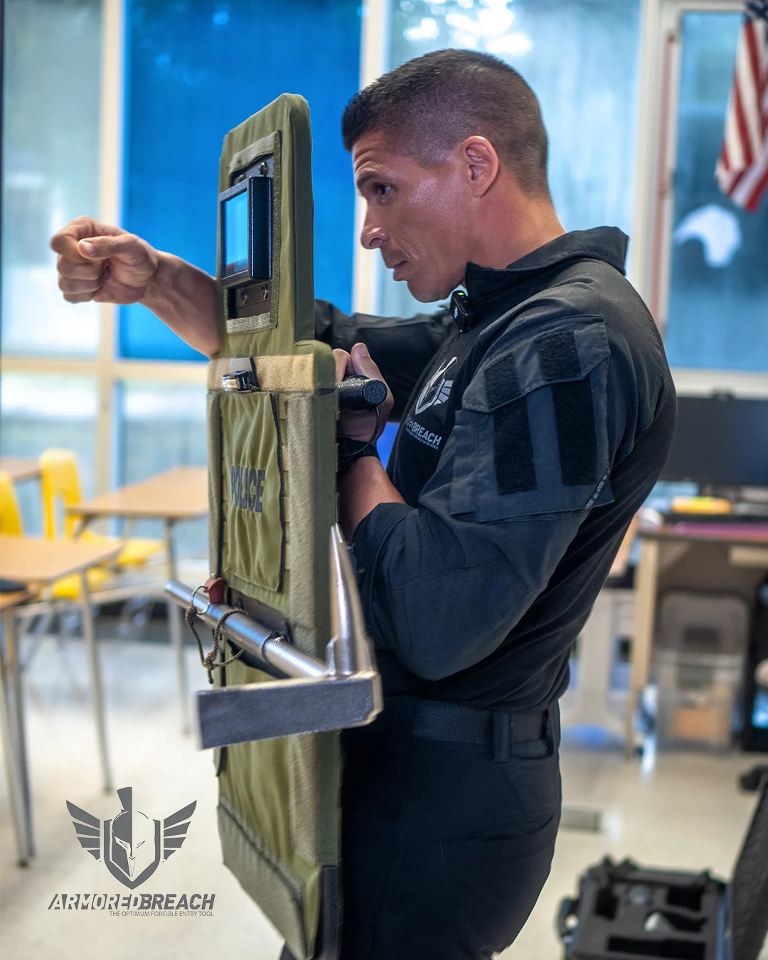 Operator carrying the Guardian Breaching Shield during tactical training