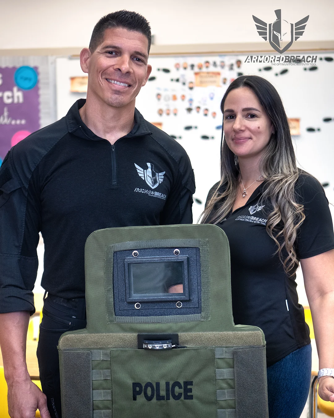 Dennis Medina and an Armored Breach team member with the Guardian Breaching Shield